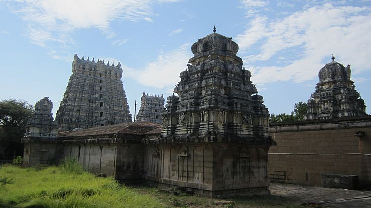 The Periyanaiaki Udanurai Brahmadesam Sivan temple is built like a fort with seven tiered Rajagopuram and huge walls. The majestic view of gopurams is seen from one side of the temple premises.