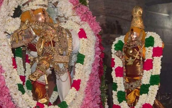 Nicely decked Chepparai Azhagiya koothar statue with jewels and flowers in Temple