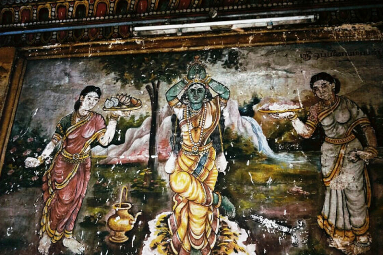 Enchanting murals of two women worshipping Amman deity of KarivalamVanthaNallur temple
