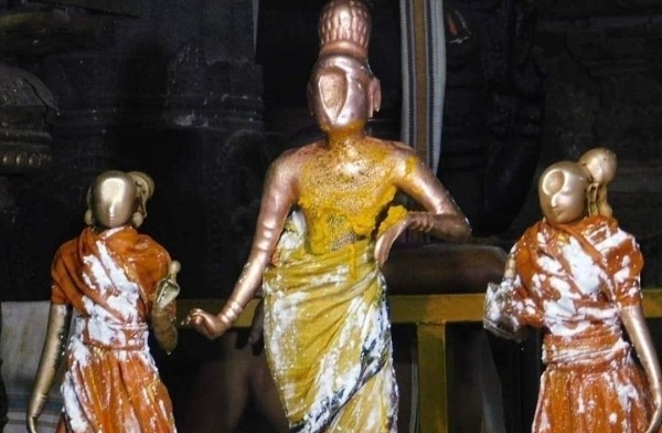 The deity Urchavar Rajagopalaswamy of Gopal Swamy Temple Palayamkottai is seen with his consorts during abhishekam.