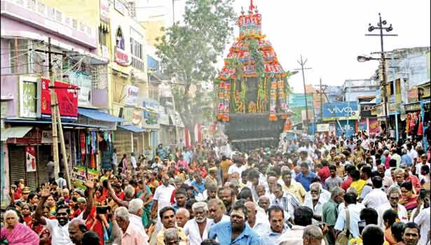 Devotees thronged the Tenkasi Kasi Viswanathar temple for an annual Chariot festival. The well-decorated chariot is pulled by people along the road in Tenkasi. 