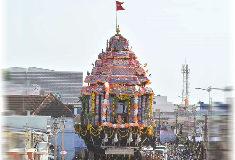 Temple car stands out in this extreme long shot of chariot being pulled during the festival