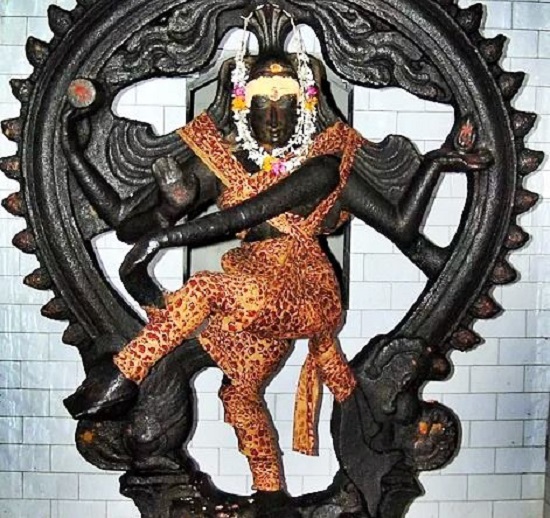 Black idol of lord nataraja wearing a leopard printed attire in Kalakad Periya Kovil.