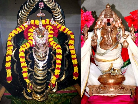 Vinayagar idols well decorated and highlighted with flowers.