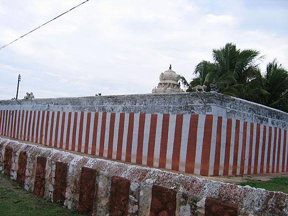 Compound wall of vittalapuram temple painted in red and white.