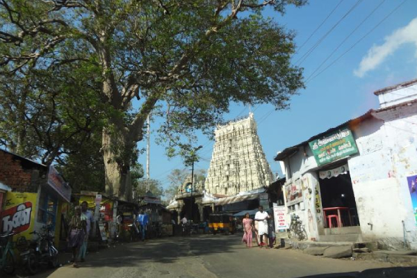 A street in tirunelveli with the temple dome seen at the background.